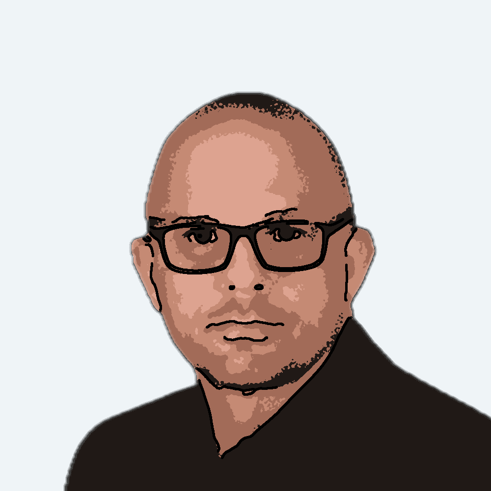 Business Tom — cartoon portrait of Thomas Cocuzza in a jacket